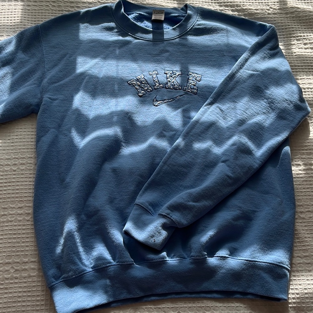 blue nike embroidered sweatshirt size small